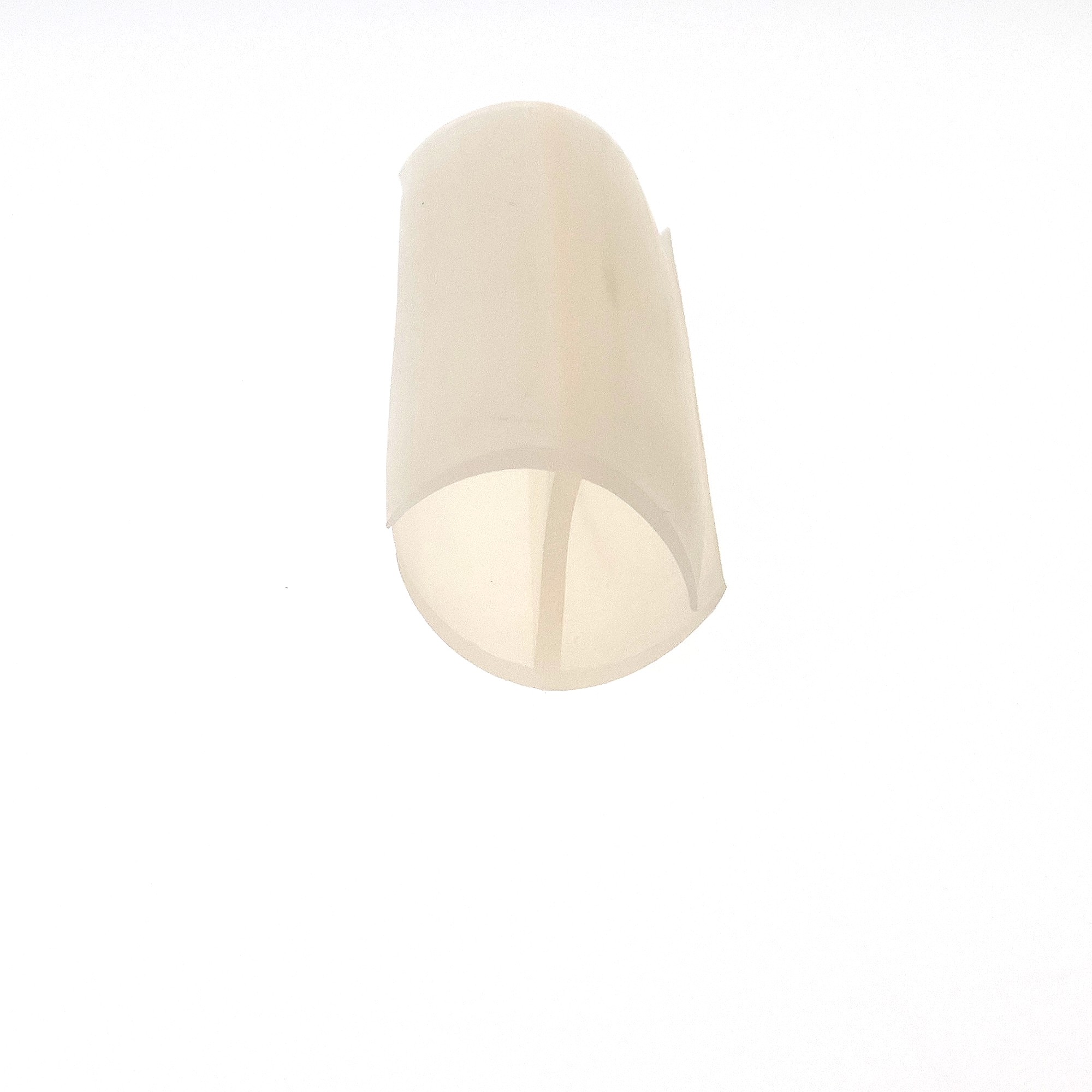 uszczelka-krawedziowa-na-szybe-silikonowa-typu-h-11-x-15-x-20mm-transparentna-matowa-0991132-1 - Centrum uszczelek Abstract beige curved shape on a white background, resembling a fingertip or nail.