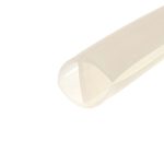 Close-up of a beige curved shape on a white background.