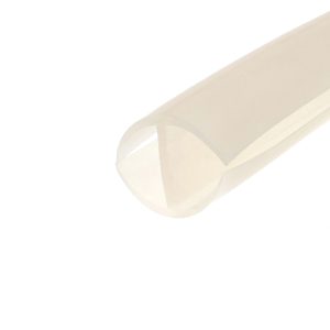Close-up of a beige curved shape on a white background.