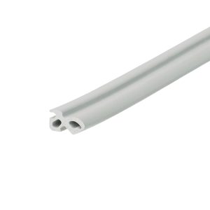 Close-up of a diagonal light-gray plastic channel with a hollow U-shaped cross-section against a white background.