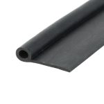 Close-up of a black cylindrical metal rod with a hollow circular opening at the end, viewed diagonally across the frame.