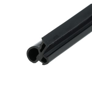 Close-up of a black pistol slide with the ejection port and rails visible on a white background.