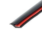 Close-up of a black tool edge with a red stripe along its side, diagonally across a white background.