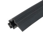 Close-up of a black, grooved plastic rod with a star-shaped (six-point) hollow end facing the camera.